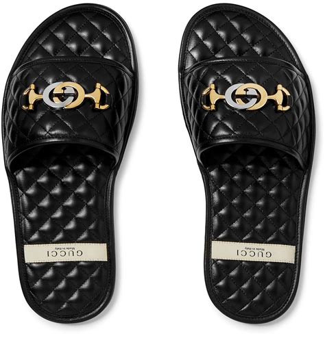 expensive Gucci slides